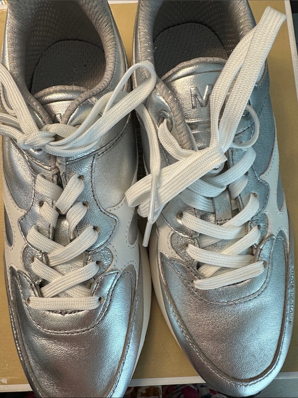 Michael Kors Silver  Sneakers.Very light to wear.